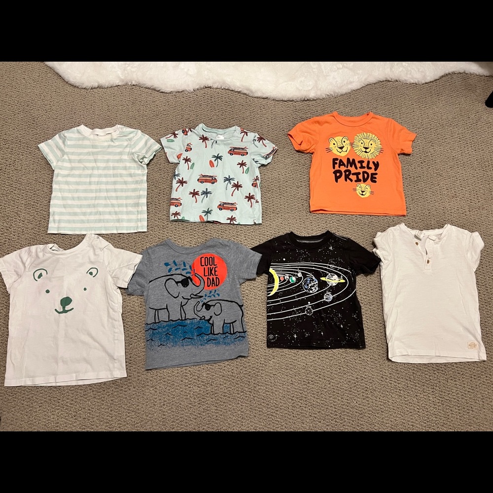 A bundle of shirts! 7 shirts varying from sizes 6-12 months.